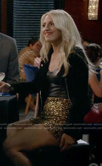 Gina’s leather bustier and gold skirt on B Positive