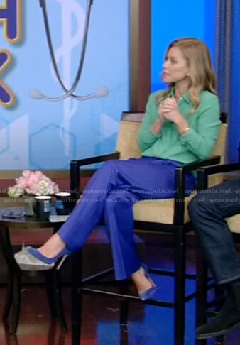Kelly’s green blouse and blue pants on Live with Kelly and Ryan