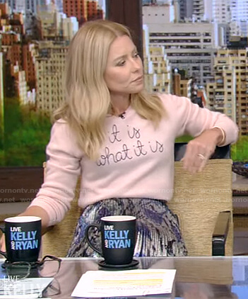 Kelly’s pink It is what it is sweater and metallic skirt on Live with Kelly and Ryan