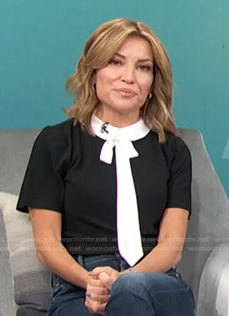 Kit’s black contrast tie neck top on Access Hollywood