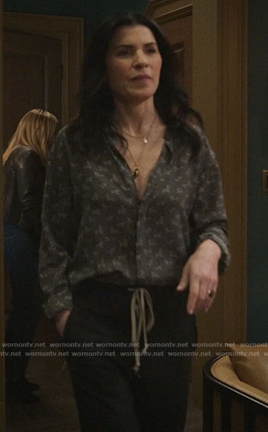 Laura’s printed button down shirt and zip pants on The Morning Show