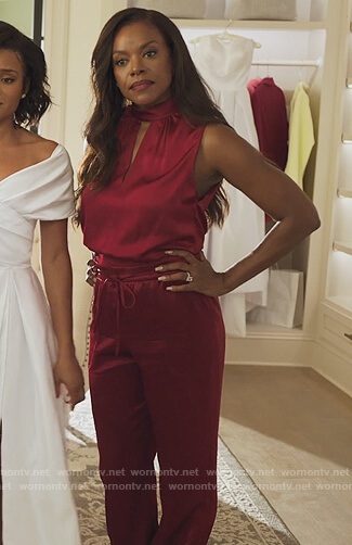 Leah’s red satin keyhole top and pants on Our Kind of People