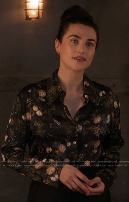 Lena’s black rose print blouse on Supergirl