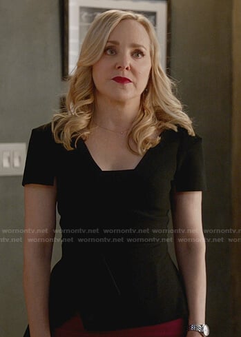Marissa’s black peplum top on Bull