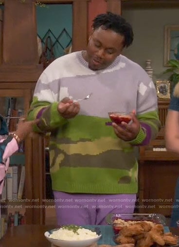 Marty’s graphic sweater on The Neighborhood
