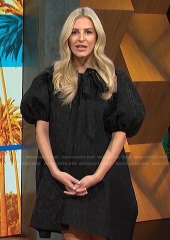 Morgan’s black balloon sleeve mini dress on E! News Daily Pop