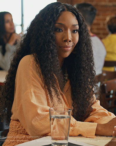 Naomi’s orange smocked shirtdress on Queens