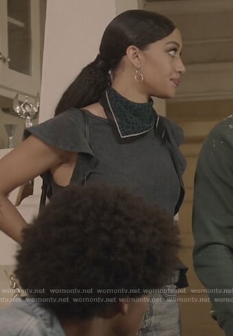 Olivia’s black ruffle tank on All American