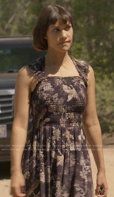 Ren’s black floral and bird print midi dress on Big Sky