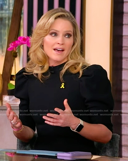 Sunny’s black bow front jumpsuit on The View