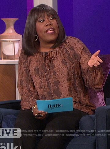 Sheryl’s brown snake print blouse on The Talk