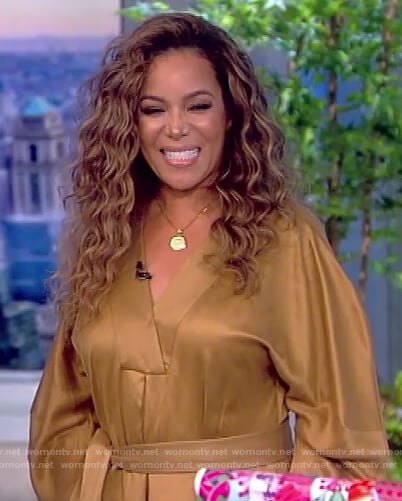 Sunny’s gold tie waist dress on The View