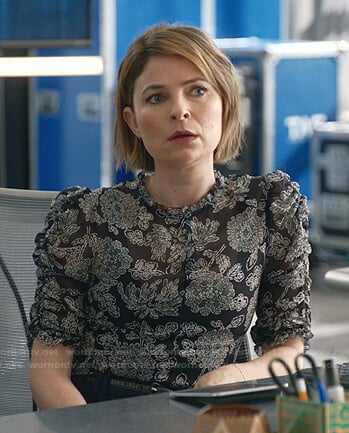 Taylor’s black floral top on Bull