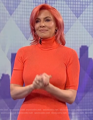 Whitney Cummings’s coral ribbed asymmetric dress on The Wendy Williams Show