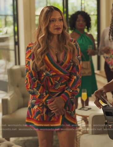 Alex’s multicolored print wrap dress on Our Kind of People