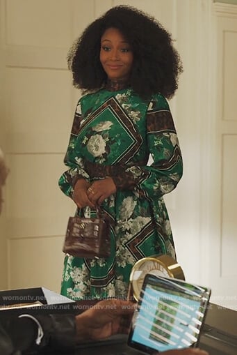 Angela’s green contrast floral tie neck dress on Our Kind of People