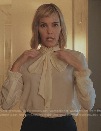 Becca’s white tie neck blouse on Love Life