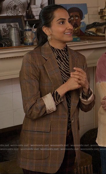 Bela’s brown plaid blazer and printed top on The Sex Lives of College Girls