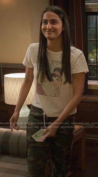 Bela’s comic graphic tee and camo sweatpants on The Sex Lives of College Girls