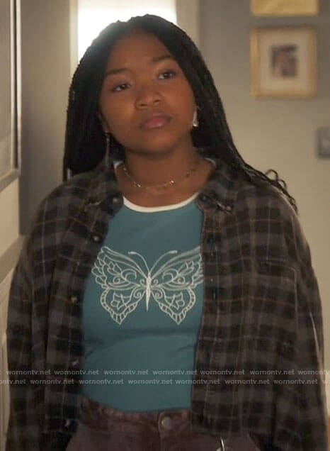 Delilah’s blue butterfly top on The Equalizer