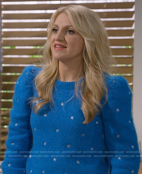 Gina’s blue star embroidered sweater on B Positive