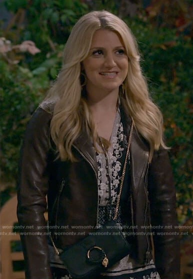 Gina’s leather jacket and ring detail bag on B Positive