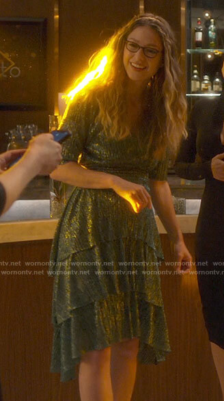 Kara’s metallic green midi dress on Supergirl