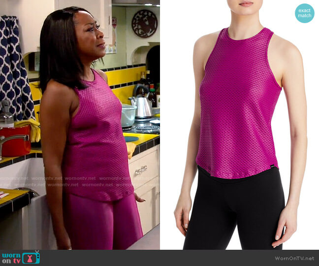 Koral Aerate Mesh Tank in Rose Orchid worn by Tina Butler (Tichina Arnold) on The Neighborhood