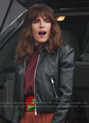 Marina’s black leather bomber jacket on Home Economics