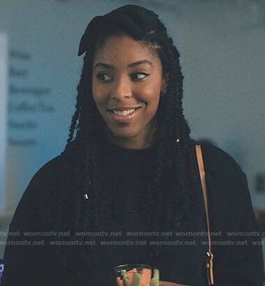 Mia’s black embroidered sweatshirt on Love Life