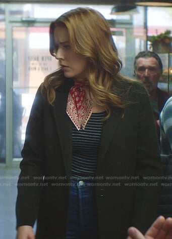 Nancy’s striped top and green coat on Nancy Drew
