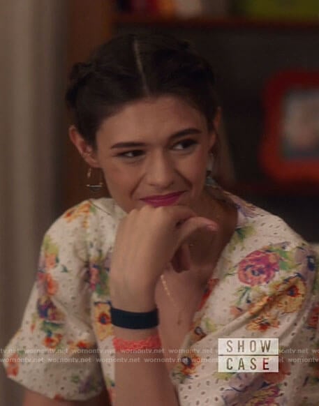 Nia’s floral eyelet top on Supergirl