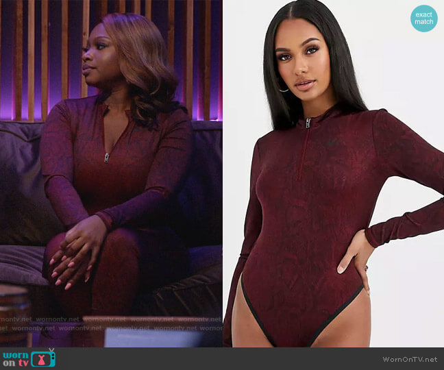 Nike Burgundy Snake Print long sleeve Bodysuit worn by Jill (Naturi Naughton) on Queens