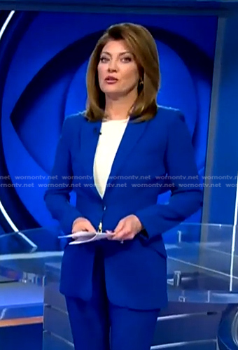 Norah’s blue blazer and pant suit on CBS Evening News