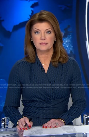 Norah’s blue herringbone wrap top and skirt on CBS Evening News