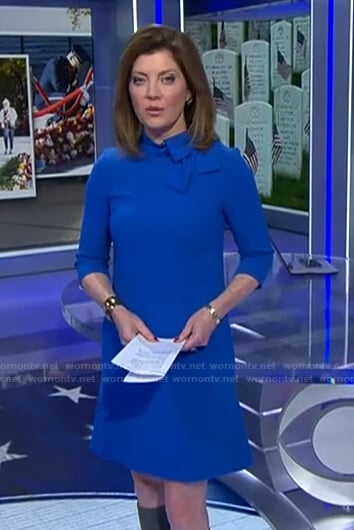 Norah’s blue bow neck shift dress on CBS Evening News