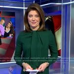 Norah’s green tie neck dress on CBS Evening News