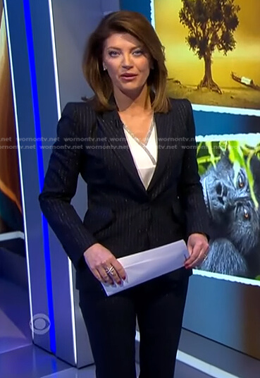 Norah’s metallic pinstripe blazer and pant suit on CBS Evening News