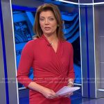 Norah’s red twisted front dress on CBS Evening News