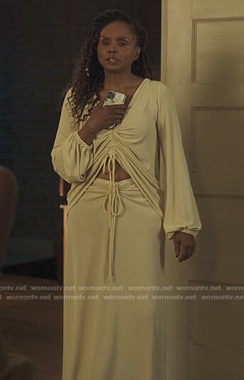 Patricia’s white ruched top and skirt on Our Kind of People
