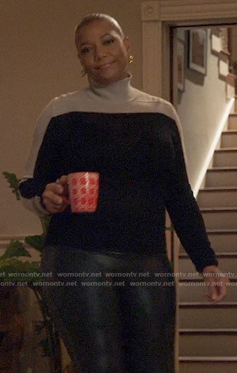 Robyn’s black colorblock sweater on The Equalizer
