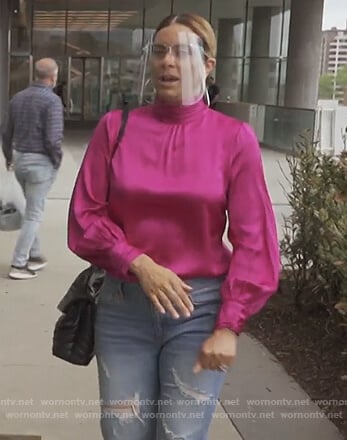 Ashley’s pink satin blouse on The Real Housewives of Potomac
