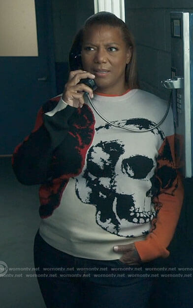 Robyn’s skull graphic sweater on The Equalizer