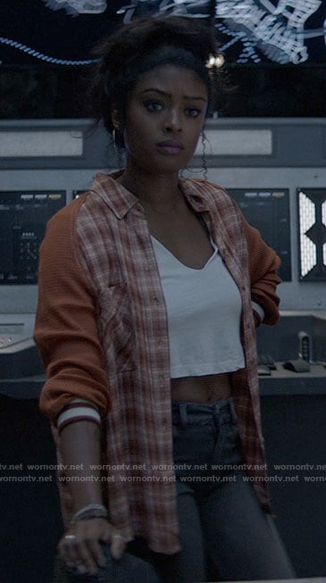 Ryan’s orange plaid shirt with solid sleeves on Batwoman