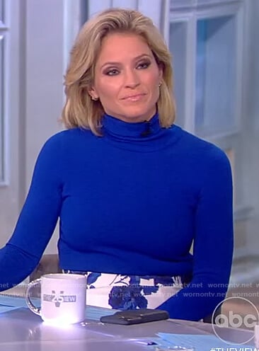 Sara’s blue turtleneck top and floral skirt on The View