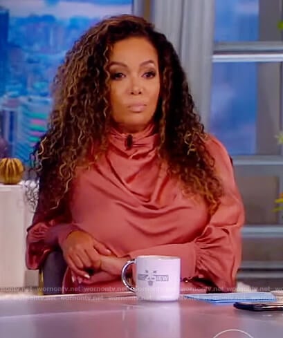 Sunny’s pink satin blouse on The View