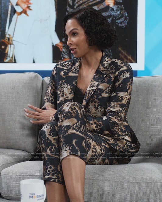 Tina’s black printed blazer and pants on Queens