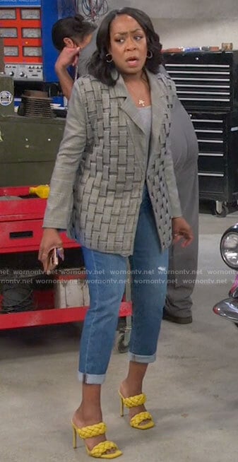 Tina’s plaid woven blazer and yellow sandals on The Neighborhood