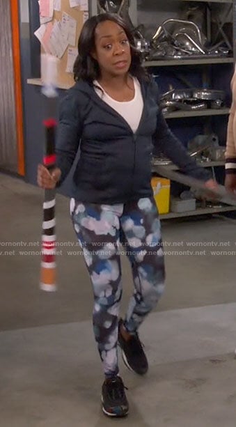 Tina’s paint splatter print leggings on The Neighborhood