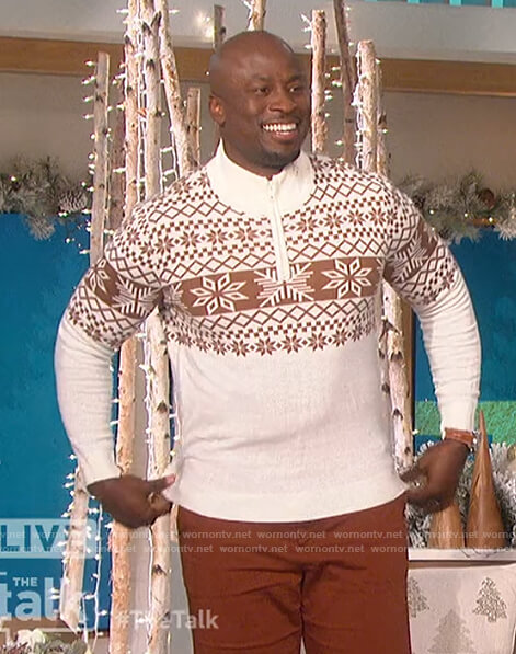 Akbar’s white Christmas sweater on The Talk